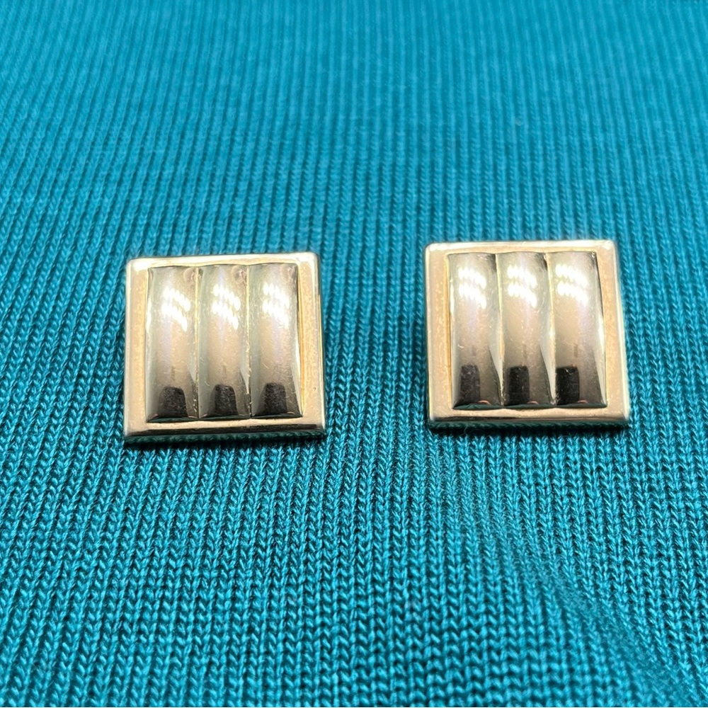 Gold tone pierced earrings